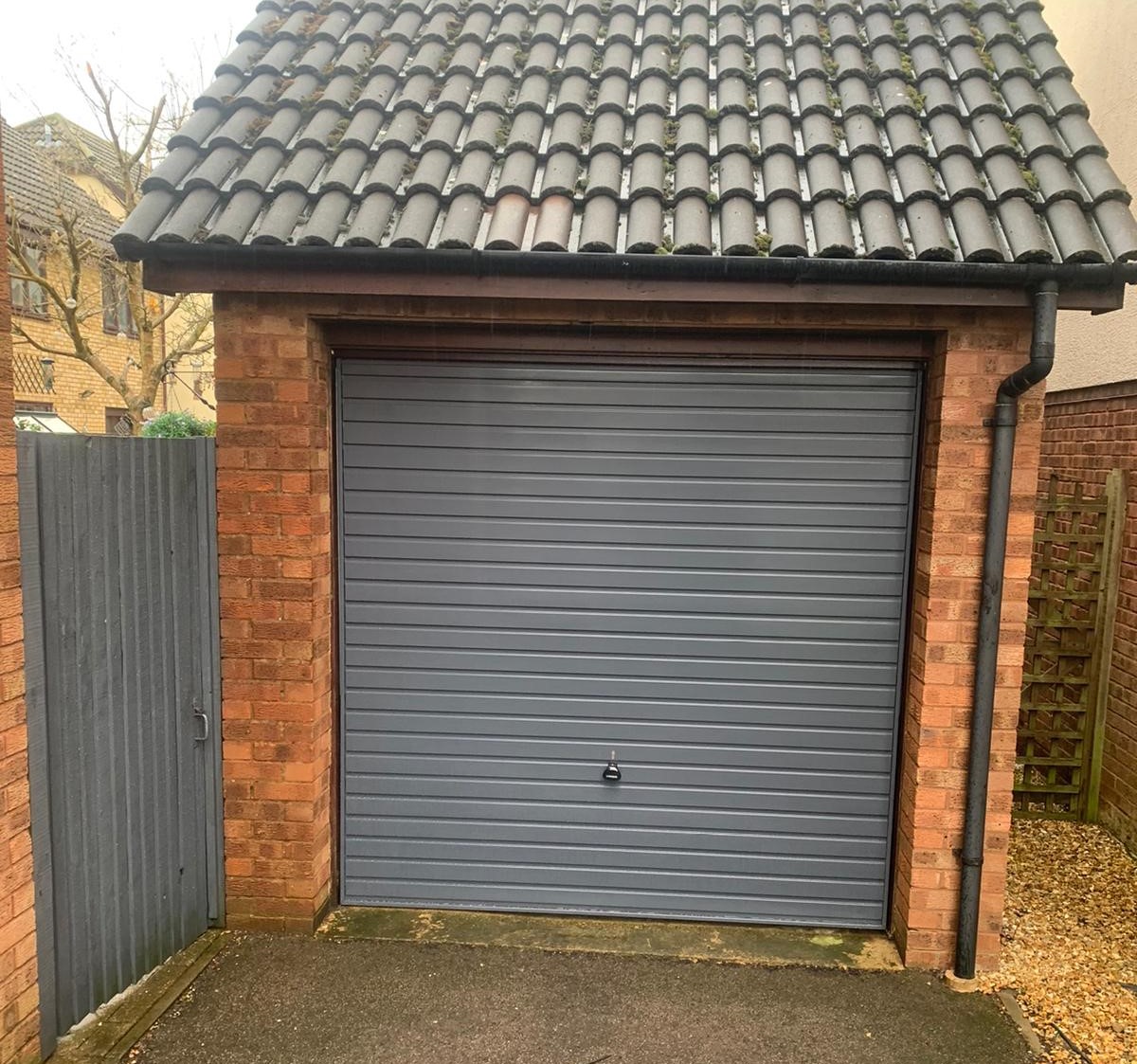 and Hormann Horizontal Slate Grey Up and Over garage door garage door fitted in Aylesbury