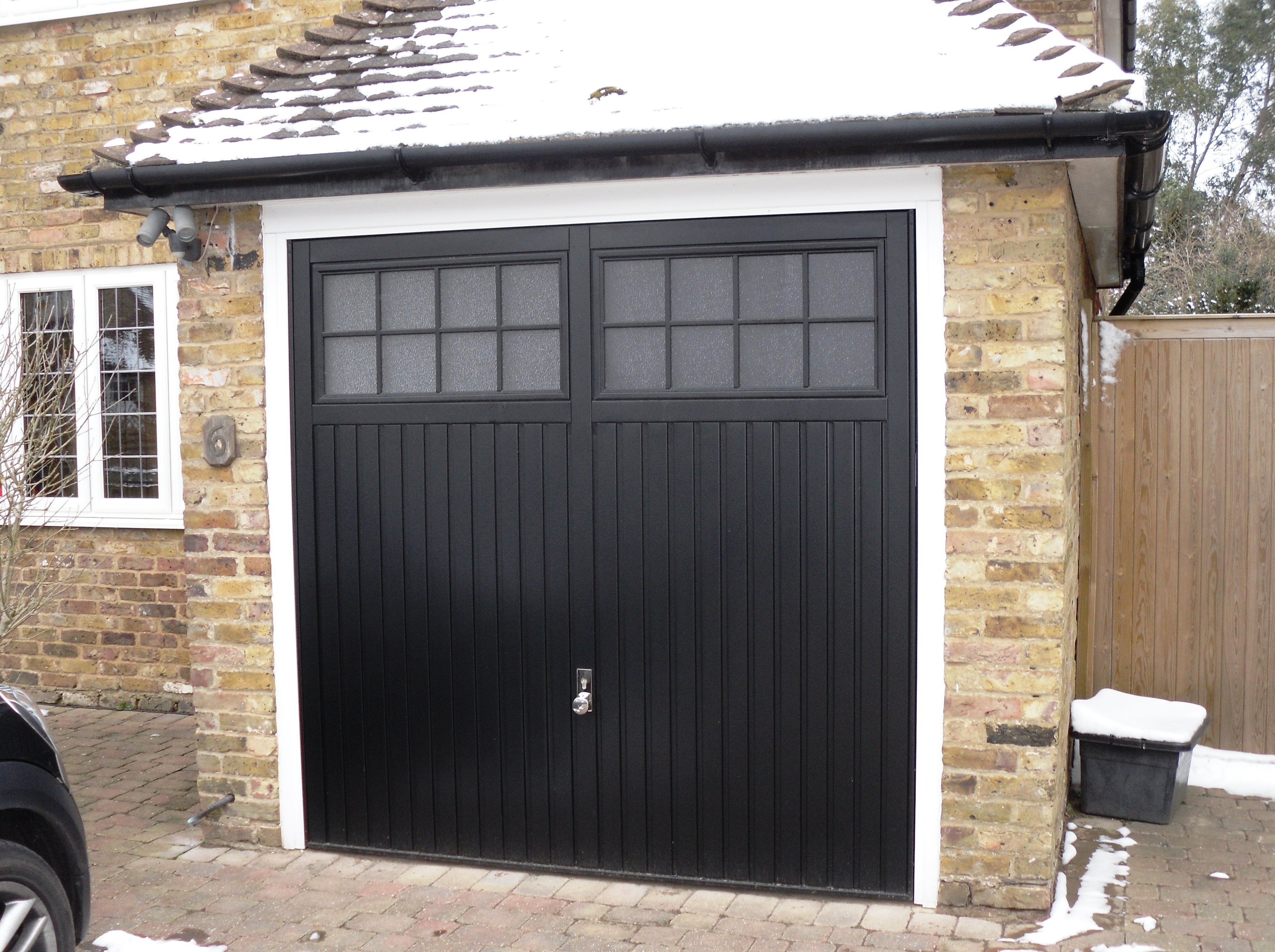 and Hormann Ilkley Black Up and Over garage door garage door installed for a customer in Princes Risborough