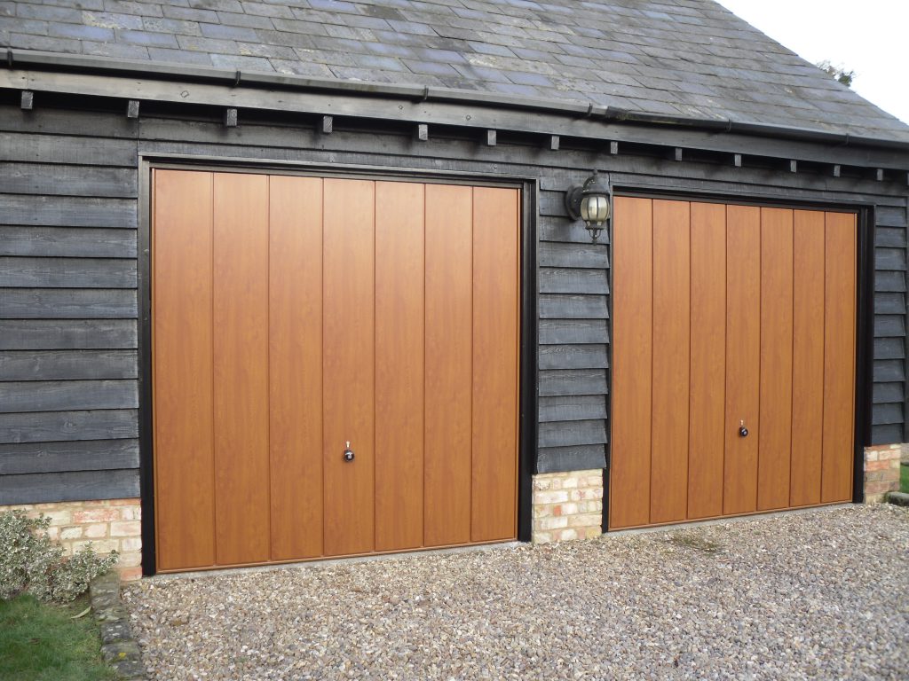 and Hormann Vertical Golden Oak Up and Over garage door garage door replacement in Beaconsfield